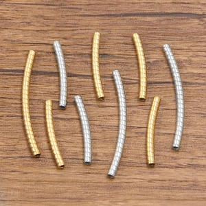 Polished gold and silver stainless steel curved tube beads with spiral texture for jewelry