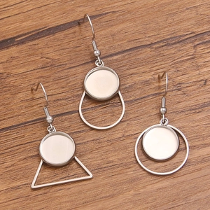 Polished stainless steel geometric earring bezels in round, triangle and drop shapes