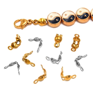 DIY jewelry connectors in gold and steel finish for necklace making with yin yang charms
