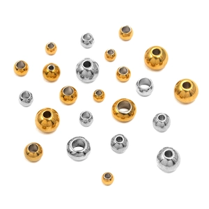 Perles d'espacement rondes en acier poli or et argent pour la création de bijoux DIY