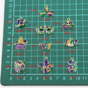Mardi Gras themed KC gold enamel charms featuring carnival masks and festive fleur-de-lis