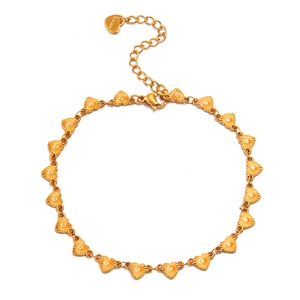 Detail of gold-plated stainless steel heart connector links with lobster clasp closure
