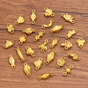DIY jewelry making charms in shapes of heart butterfly and flower with gold plated finish