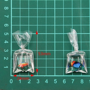 Macro view of transparent resin fish pouch pendant with 53mm by 24mm size dimensions
