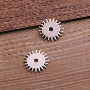 18mm silver alloy steampunk gear charms on rustic wood background for DIY jewelry making