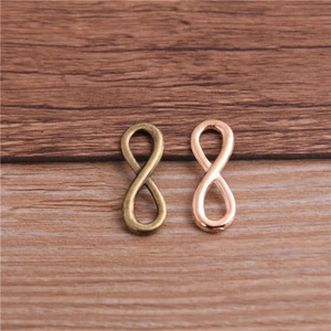 Infinity symbol alloy connectors in antique bronze and rose gold for DIY bracelets