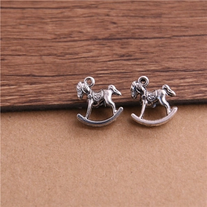Vintage silver rocking horse charms for DIY jewelry making with retro carved details