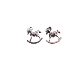 Pair of vintage silver rocking horse charms for DIY jewelry making with relief details