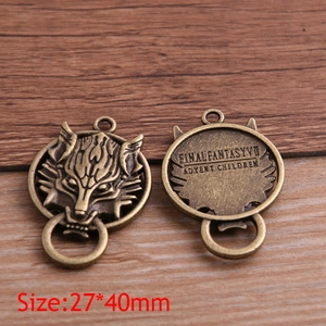 Vintage bronze wolf head charm set showing 27x40mm size detail on a wood background