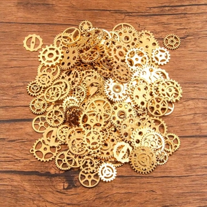 Assortimento di ingranaggi steampunk dorati in lega per creazione gioielli fai-da-te