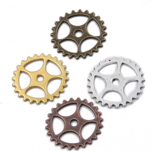 Set of four 25mm steampunk alloy gear charms in bronze, gold, and silver finishes