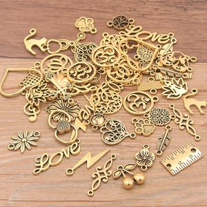 Lot de 100g de breloques DIY en alliage doré vintage avec motifs cœur et animaux