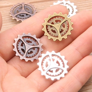 Steampunk style 22mm hollow alloy gear charms for DIY bracelets in bronze and silver