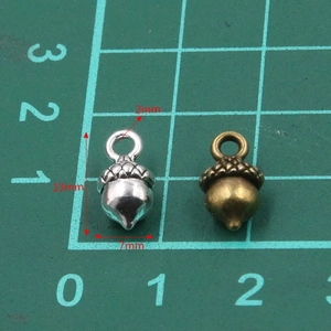 Vintage silver and bronze pine cone alloy charms for DIY necklaces and bracelets 13x7mm