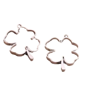 Set of two rose gold hollow four-leaf clover flower charm pendants for DIY jewelry