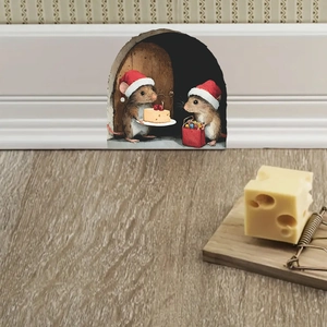 Detailed view of 3D Christmas mouse hole wall sticker with mice, cake, and gift bag