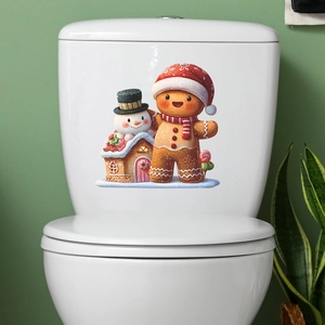 Christmas snowman gingerbread man and house stickers on white toilet tank