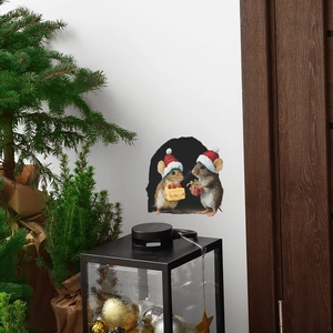 Detailed wall decal of Christmas mice with cake and gifts near a realistic mouse hole