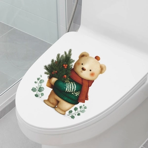 Christmas bear wall sticker on toilet lid with red scarf and pine branch decoration