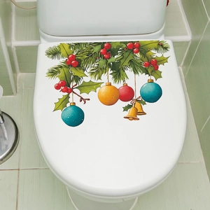 Sticker pour abattant de WC de Noël avec branches de pin, baies rouges et boules colorées