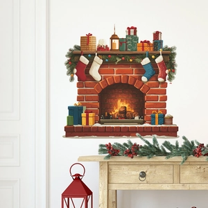Christmas wall decal featuring a red brick fireplace with stockings and holiday gift boxes
