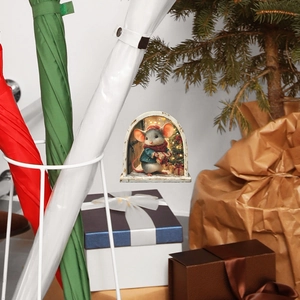 Detail showing a miniature wooden 3D Christmas mouse hole wall sticker with festive mouse