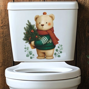 Cartoon Christmas bear wall decal with pine branch on white ceramic toilet tank