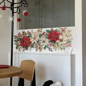 Christmas wall decal with red poinsettias and green pine branches for home decoration