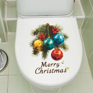 Merry Christmas toilet seat sticker with pine needles, red berries and colorful baubles