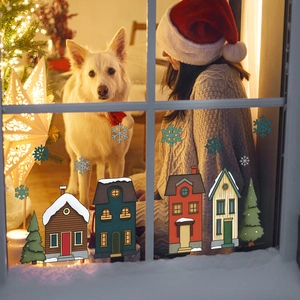 Christmas town window stickers with snowy houses and trees for festive glass decoration