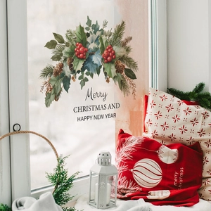 Christmas wreath window sticker with holly and pinecones for festive home glass decoration