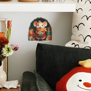 Detailed view of 3D Christmas mouse hole wall sticker with gifts on a white home wall