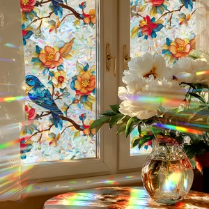 Retro floral blue bird window film with decorative rainbow prism and privacy frost effect