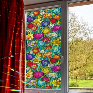 Colorful floral stained glass window film providing privacy and decorative laser effect