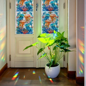 Rainbow prism window film with colorful jellyfish and coral on white glass doors