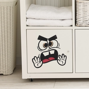 Funny cartoon facial expression wall sticker on a white wooden cabinet door for home decor