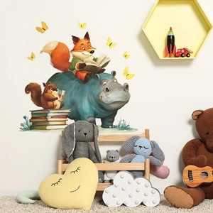 Adorable animal wall stickers for kids rooms featuring a fox reading on a hippo