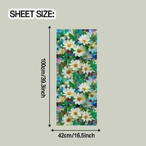 Detail view of floral static window film showing 100cm x 42cm sheet size dimensions