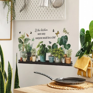 Adesivi murali con piante verdi e farfalle con citazione ispiratrice da cucina
