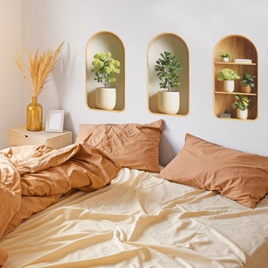 Minimalist terracotta and beige cotton bedding set shown in a cozy modern bedroom
