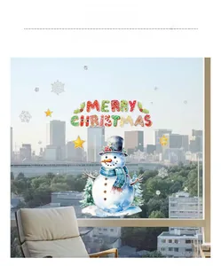 Detail of Christmas snowman and snowflake window stickers on a bright city window