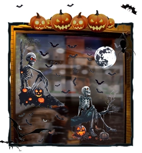 Detail of Halloween window clings featuring skeletons, pumpkins, and bats on glass