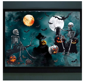Detail of Halloween window clings featuring skeletons, pumpkins and bats on glass