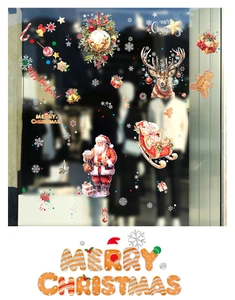 Détails d'autocollants de fenêtre de Noël avec Père Noël renne et motifs festifs