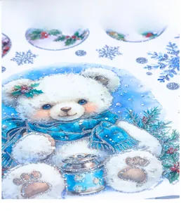 Close-up of watercolor Christmas bear window sticker with silver glitter snowflake detail