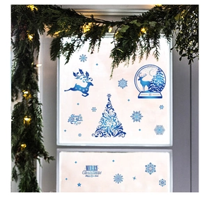 Detailed blue Christmas window decals featuring gold reindeer, Xmas trees, and snowflakes