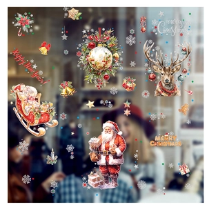 Détail de stickers électrostatiques de Noël avec Père Noël, renne et flocons dorés