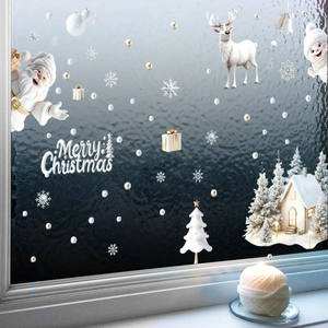 Christmas window decals with Santa Claus, reindeer and snowflakes for festive glass decoration