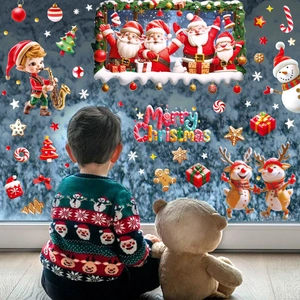 Christmas window decals with Santa, reindeer and snowman in cozy home holiday setting