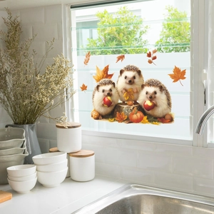 Autumn window clings featuring cute hedgehogs with apples, pumpkins and fall leaves
